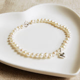 Girl's Seed Pearl Bracelet with Tiny Heart Charm